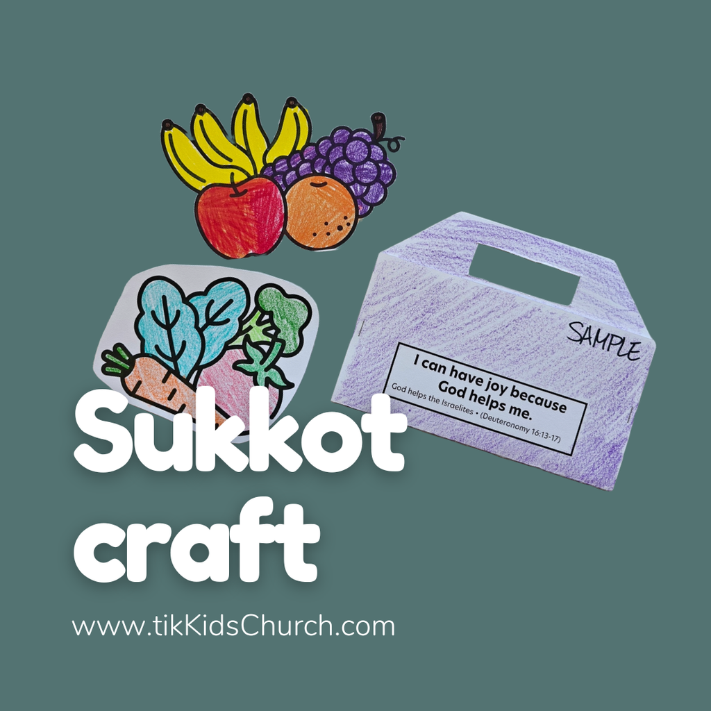 Sukkot craft kit with fruits, vegetables, and a message card on a green background.